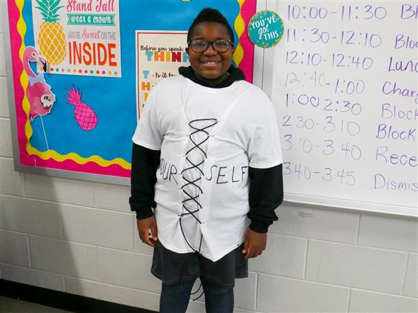 Fifth Graders putting on a Pun Fashion Show.